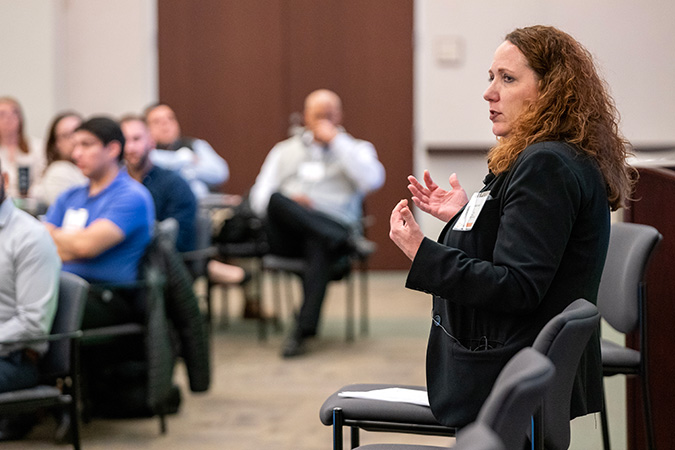 Senior Vice President and Chief Human Resources Officer Judy Carter speaks to attendees.