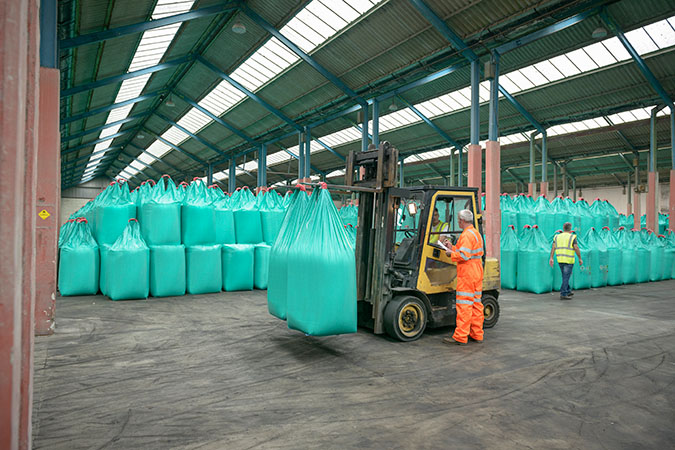 Fertilizer is stored for further blending. Fertilizer is stored for further blending.